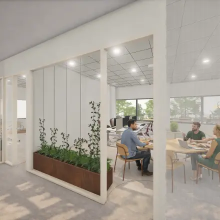 Office space at Luttenbergweg 8, Amsterdam South East features a bright, furnished interior with people in a meeting, ideal for office space rental.