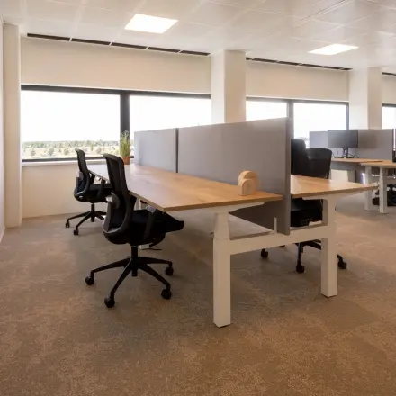 Spacious office to rent at Luttenbergweg 8, Amsterdam South East, featuring modern workstations and ample natural light, ideal for office space rental.
