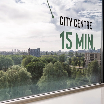 Scenic city view from an office window at Nachtwachtlaan 20 with city center 15 minutes away.
