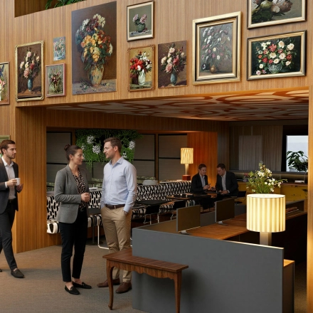 Modern office space in Amsterdam Zuidas, featuring stylish decor and people engaged in discussions, perfect for office space rental needs.