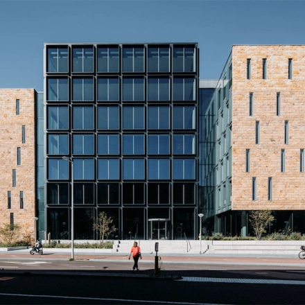 Exterior view of an office building at Fred. Roeskestraat 100, Amsterdam Zuidas, highlighting the modern architectural design suitable for office space rental.