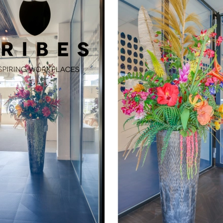 Colorful floral arrangement in the entrance of an office space at Gustav Mahlerlaan 308, Amsterdam Zuidas, ideal for office space rental.