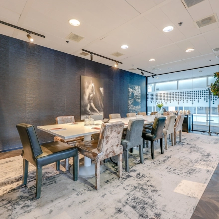 Spacious conference room at Gustav Mahlerplein, Amsterdam Zuidas, perfect for office space rental with elegant decor and ample natural light.