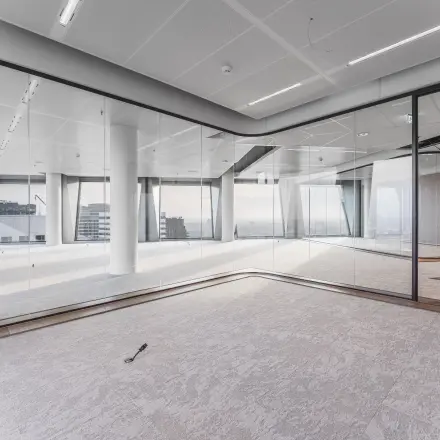 Spacious unfurnished office space with glass walls, ideal for office space rental in Amsterdam Zuidas at Hildegard Von Bingenstraat 44.