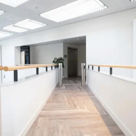 Bright hallway interior at Schumanpark 9, Apeldoorn, ideal for office space rental.