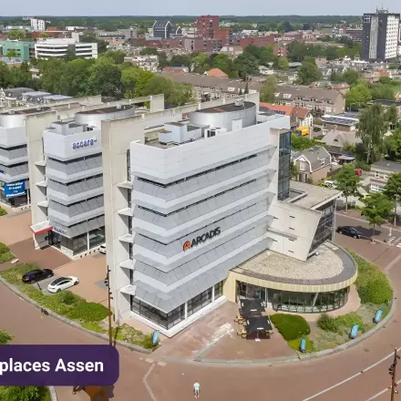 Aerial view of office buildings at Stationsplein 10, Assen, ideal for office space rental.