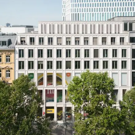 Exterior view of an office building at Kurfürstendamm 14, Berlin Charlottenburg, showcasing potential office space rental opportunities in the area.