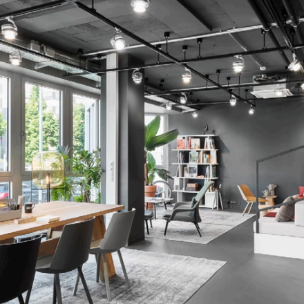Modern, well-lit office interior at Koppenstraße 93, Berlin Friedrichshain, featuring stylish furnishings and sleek design elements, perfect for office space rental.
