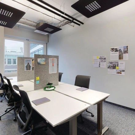 Bright office space at Koppenstraße 93, Berlin Friedrichshain, featuring desks and chairs in a well-lit environment. Ideal for office space rental.
