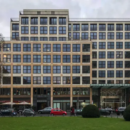 Exterior view of office building at Friedrichstraße 68, a prime location for office space rental in Berlin Mitte.