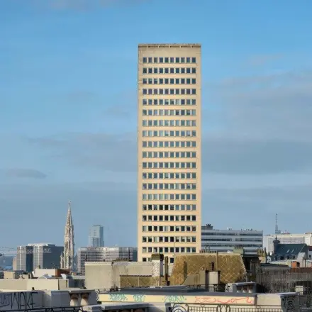 View of an office building located on Rue Joseph Stevens 7 in Brussels Center, ideal for those seeking office space rental.