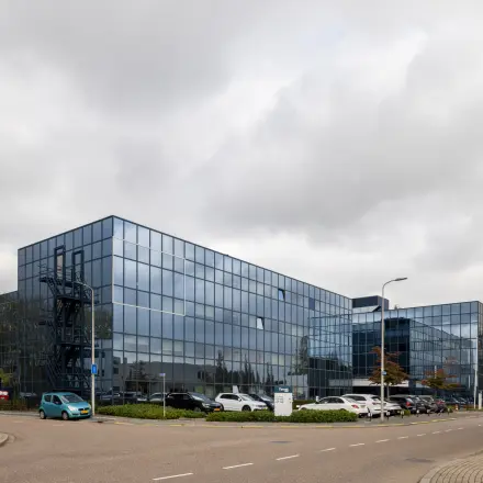 Modern office building at Essebaan 63, Capelle aan den IJssel, ideal for office space rental with ample parking.