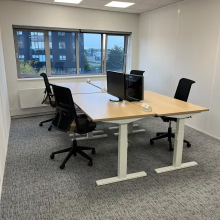 Furnished office space with desks and swivel chairs at Rivium Quadrant 75, ideal for business activities.