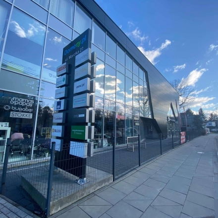 Exterior view of the Marcika 27 office building in Cracow Łagiewniki Borek Fałęcki, showcasing a sleek modern design perfect for office space rental.