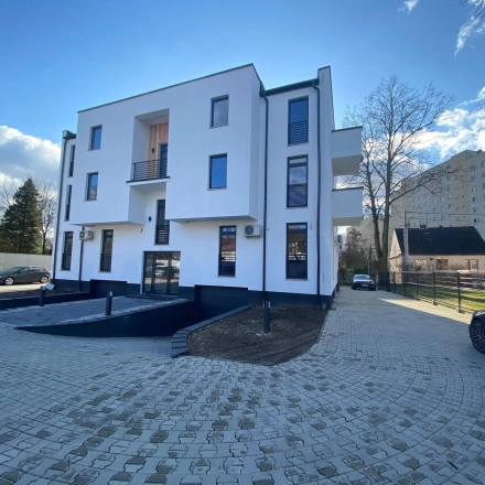 Exterior view of the office building at Jastrzębia 24, Cracow Podgorze Duchackie, showcasing a modern facade, ideal for office space rental.