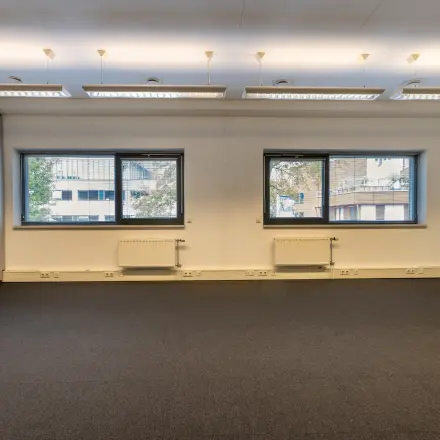 Office space at Delftechpark 9, Delft, featuring large windows and ample natural light, ideal for office space rental.