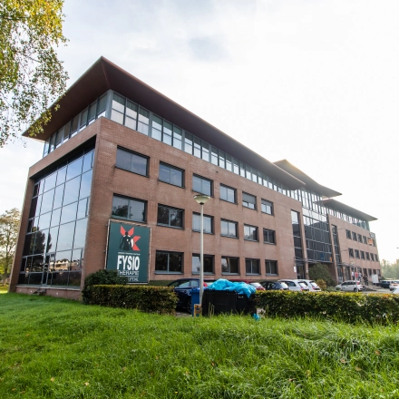 Exterior view of the office building located at Marshalllaan 2, Delft, ideal for office space rental with parking available.