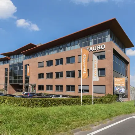 Exterior view of office building at Marshalllaan 2, Delft, showcasing rental office space availability.