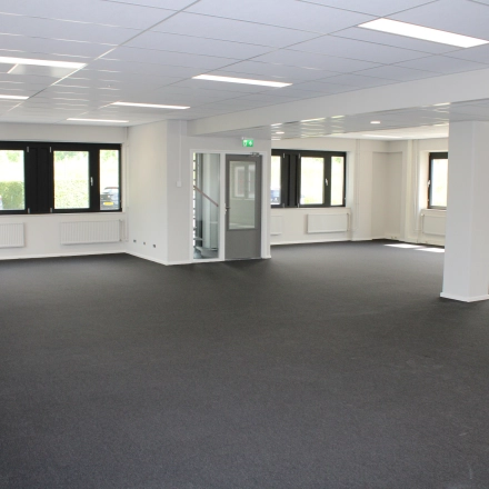 Spacious office space for rent at Keulenstraat 1 in Deventer, featuring large windows and ample natural light. Ideal for businesses seeking an open floor plan for office space rental.