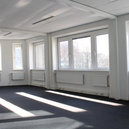 Bright office space rental with large windows at Keulenstraat 12, Deventer, offering a spacious layout for your next office to rent.