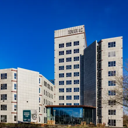 Exterior view of the modern office building at Diemerhof 42, Diemen, ideal for office space rental.