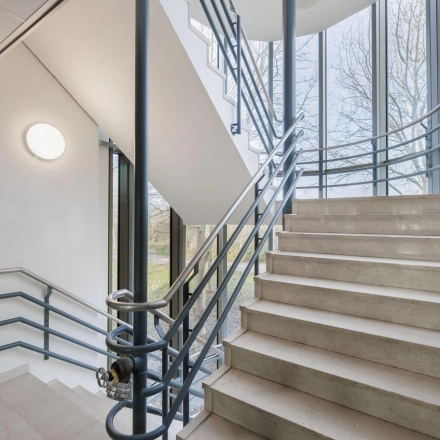 Staircase at Wisselwerking 40-48 in Diemen, ideal for office space rental with sleek design and ample natural light.