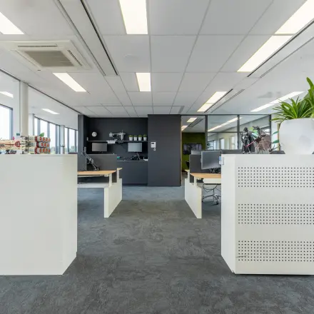 Bright office space with modern furnishings and ample natural light at Meerenakkerplein 1-10, Eindhoven De Hurk. Ideal for office space rental.