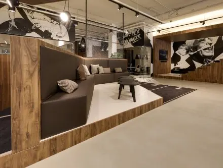 Stylish office space at Frederiklaan 10E, Eindhoven Strijp-S, featuring modern seating and wall art, ideal for office space rental.