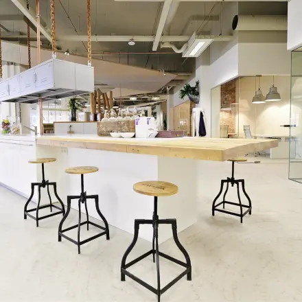 Modern office in Eindhoven Strijp-S with contemporary furnishings and open layout, ideal for office space rental. Sleek design and ample seating make this a perfect office to rent.