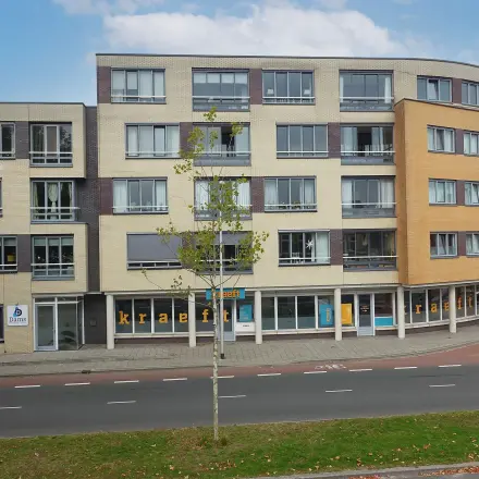 Exterior view of the office building located at Boddenkampsingel 95 in Enschede, showcasing potential office space rental options.
