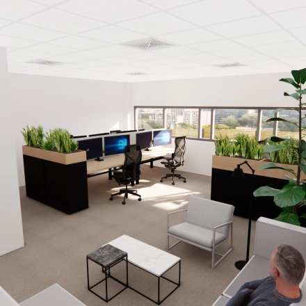 Modern office interior at Brandweerstraat 20-30, Enschede featuring open workspaces with desks, chairs, plants, and large windows offering natural light. Ideal for anyone looking for office space rental.