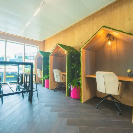 Bright office space at Moutlaan 1-23, Enschede, featuring cozy work pods with natural light, ideal for rent office space seekers.