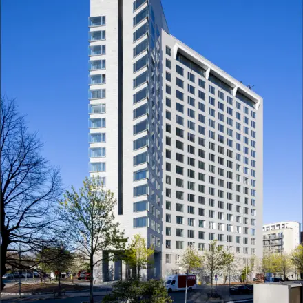 Tall modern office building at Solmsstrasse 83, Frankfurt Bockenheim, ideal for office space rental.