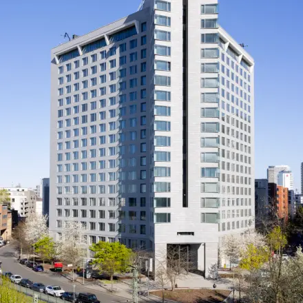 Exterior view of a modern office building located at Solmsstrasse 83 in Frankfurt Bockenheim, suitable for office space rental.