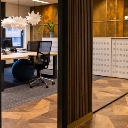Modern office space at Zuidelijk Halfrond 1, Gouda, featuring stylish furnishings and decorative elements, ideal for those seeking office space rental.