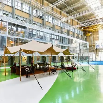 Spacious interior at Helperpark 270-298 in Groningen featuring a unique tented meeting area. Ideal for office space rental.