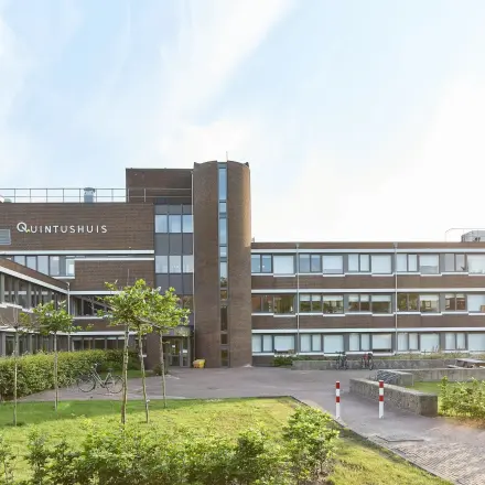 Exterior view of office building at Schweitzerlaan 12 in Groningen, showcasing potential office space rental opportunities.