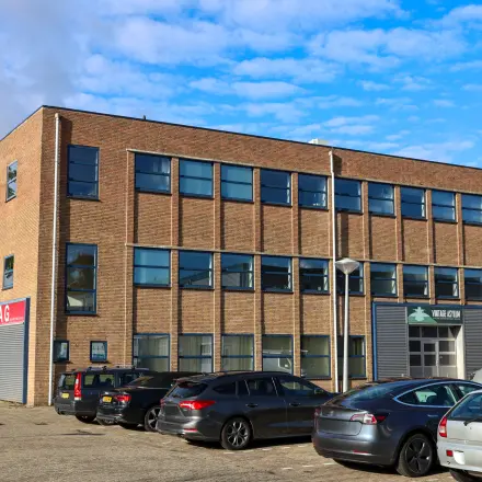 Exterior view of an office building located at Nijverheidsweg 50 in Haarlem Oost, showcasing a potential office space rental.