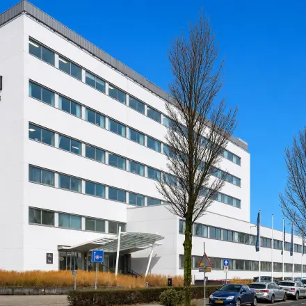 Exterior view of a modern office building at A. Hofmanweg 5A, Haarlem Waarderpolder, showcasing available office space rental opportunities.