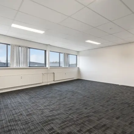 Spacious office to rent at Bingerweg 18A-18R in Haarlem Waarderpolder, featuring ample natural light and a clean, modern aesthetic, perfect for versatile office space rental needs.