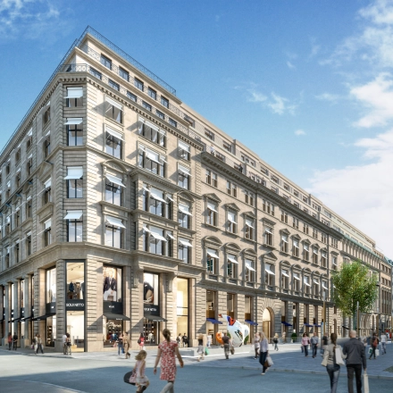 Exterior view of the office building at Alter Wall 32 in Hamburg Old Town, with people walking nearby, ideal for office space rental.
