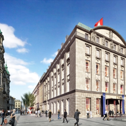 The exterior of an office building at Alter Wall 32 in Hamburg Old Town. People are walking nearby, showcasing a vibrant location for rent office space.