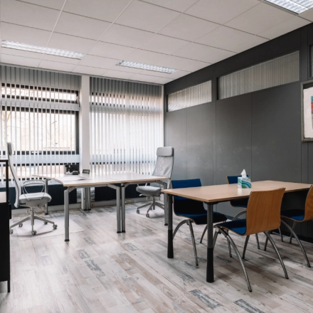 Furnished office space at De Vos van Steenwijklaan 75, Hoogeveen, featuring desks, chairs, and modern decor, ideal for rent office space.