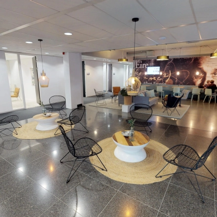 Modern office space for rent at Meidoornkade 22, Houten, featuring a furnished, open floor plan with stylish seating areas and a collaborative atmosphere.