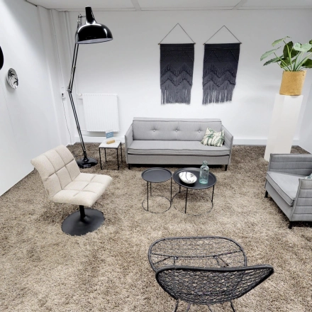 Stylish office space rental at Meidoornkade 22, Houten, featuring chic furniture with modern decor elements.