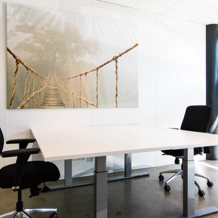 Office to rent at Brieltjenspolder 28, Made, featuring a furnished workspace with two chairs around a white table, suitable for business activities.