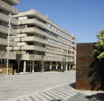 Exterior view of office building at Plaza Santa María Soledad Torres Acosta 1, Madrid Center showcasing modern architecture and spacious surroundings.