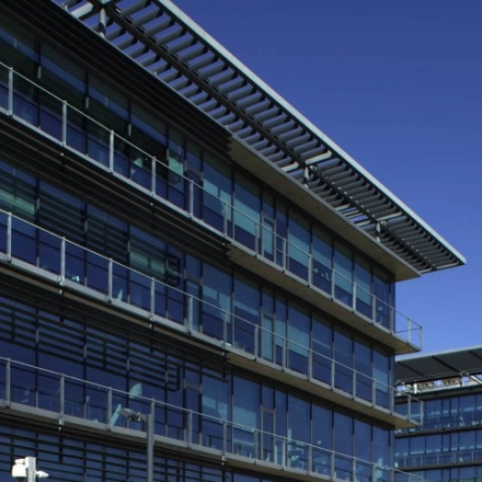 Exterior view of a modern office building located at Calle Quintanavides 13, Madrid Fuencarral-El Pardo, ideal for office space rental.