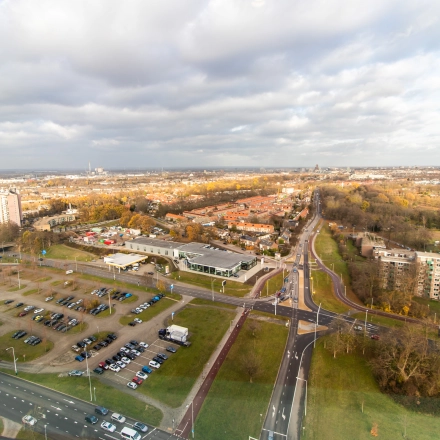 Aerial view of Jonkerbosplein 52 in Nijmegen, showcasing surrounding roads and parking areas.
