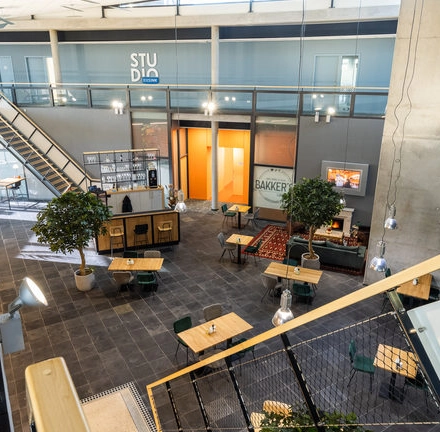 Spacious and modern office space in Oosterwolde with multiple workstations and a contemporary design, ideal for office space rental.